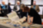 Attendees taking a look at our Swansea map